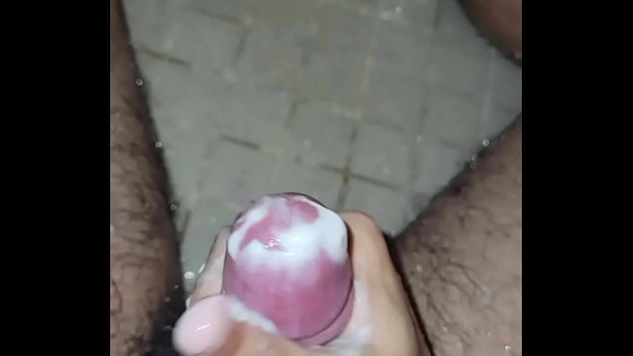 Solo cumshot while taking a zhower