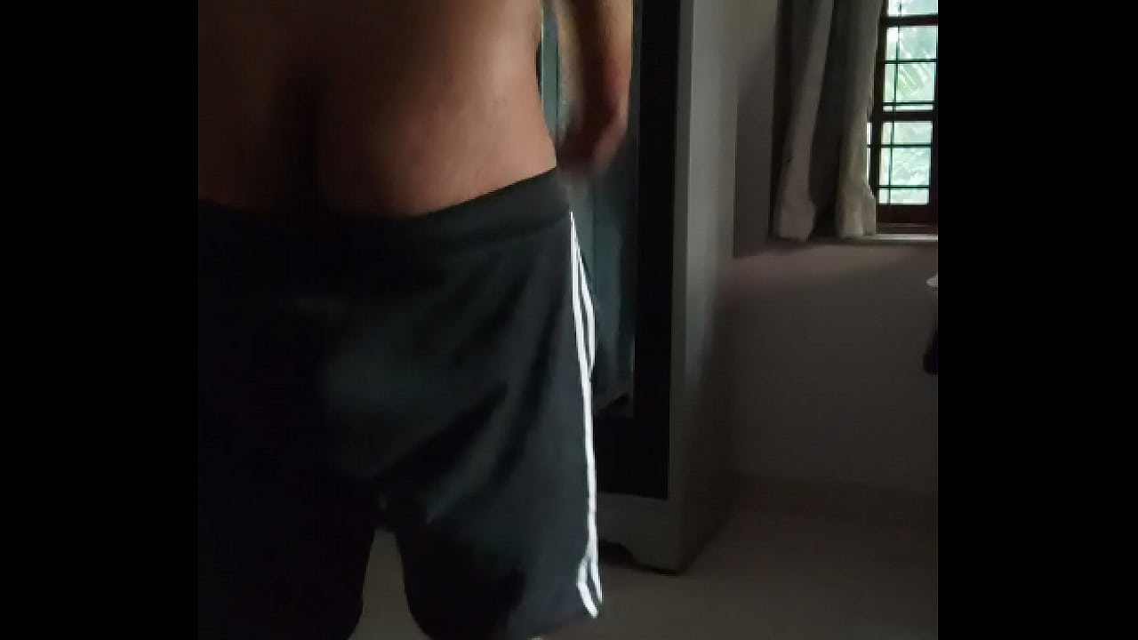 Indian young boy exercises while clothes fall off