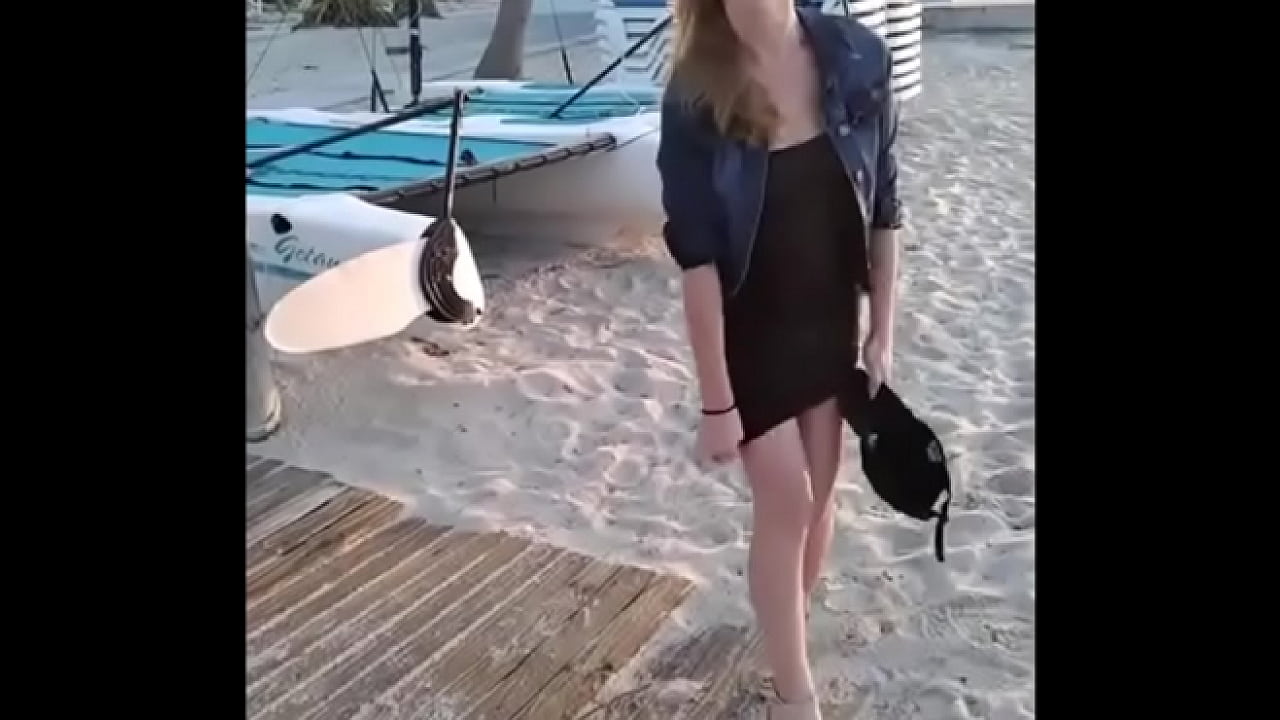 Sexy blonde about to get naked on the beach nice ass slim tits