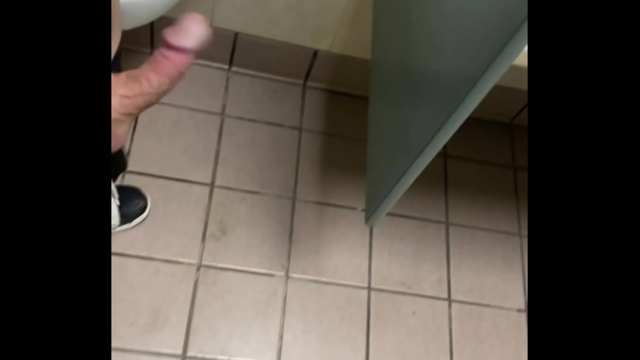 Jerking in a public bathroom!