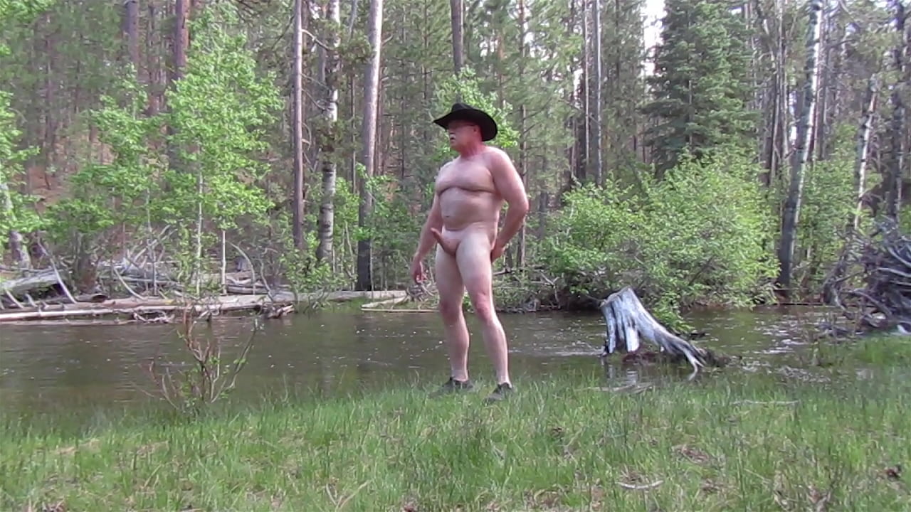 Naked and hard in the outdoors.