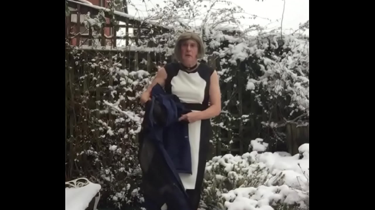 Outside in the snow - Johanna poses in dress.