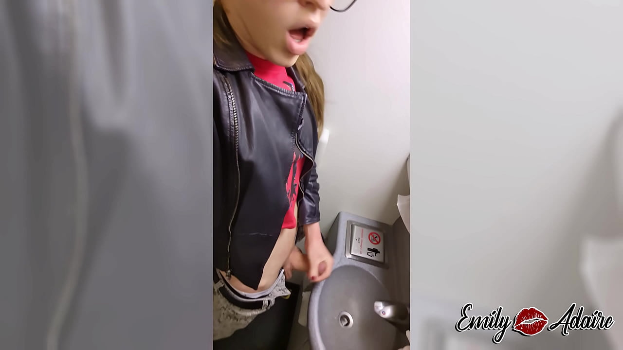 Shemale jerks off in the plane restroom and cums