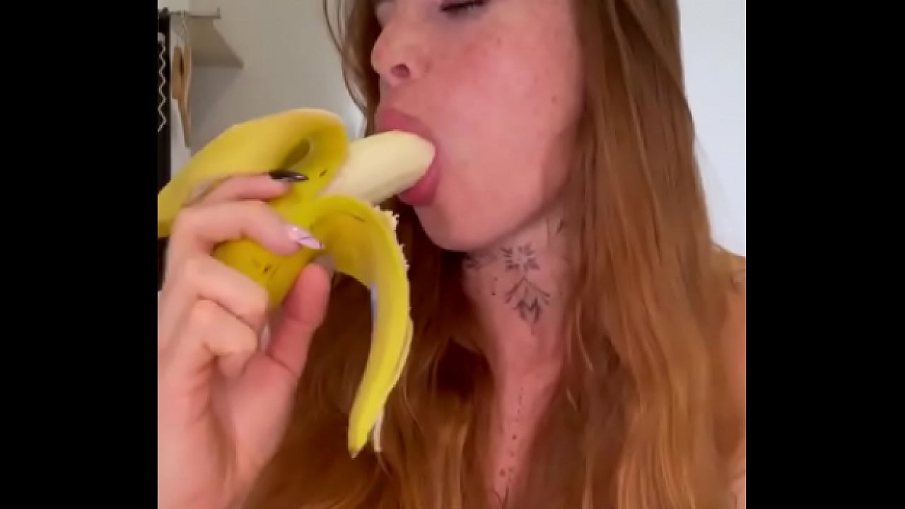 Ginger Teen Sucks On Banana