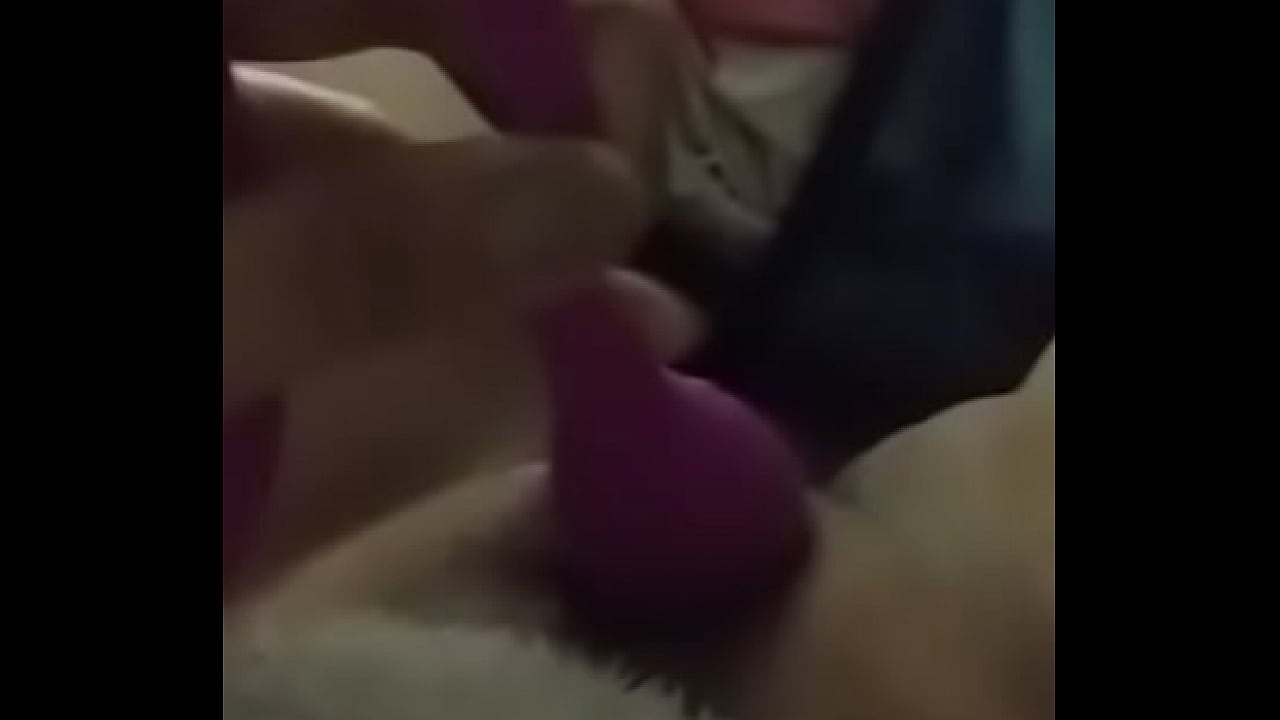 Girlfriend doing herself with a toy