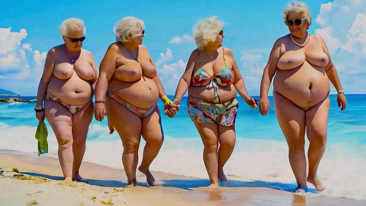 Older women with big breasts walk on the beach