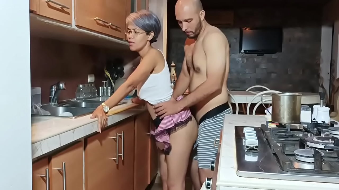 I fuck my stepmom in the kitchen while daddy is in the room