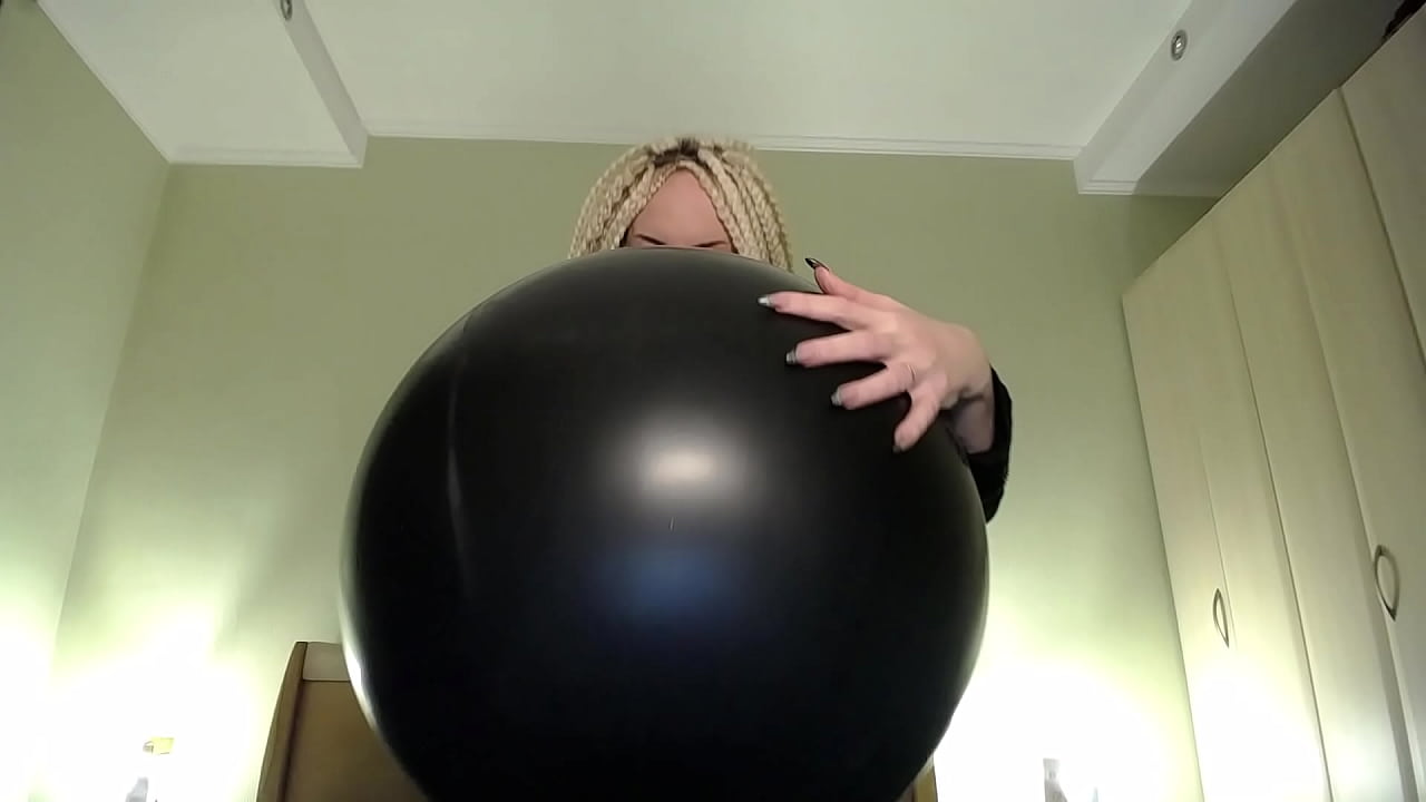 Blow big balloon and pop with long nails