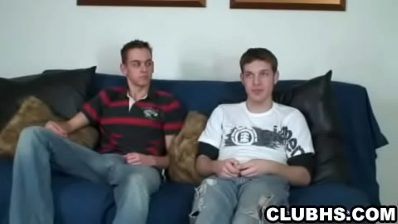 Two honry hunks tugging their cocks on the couchm 1