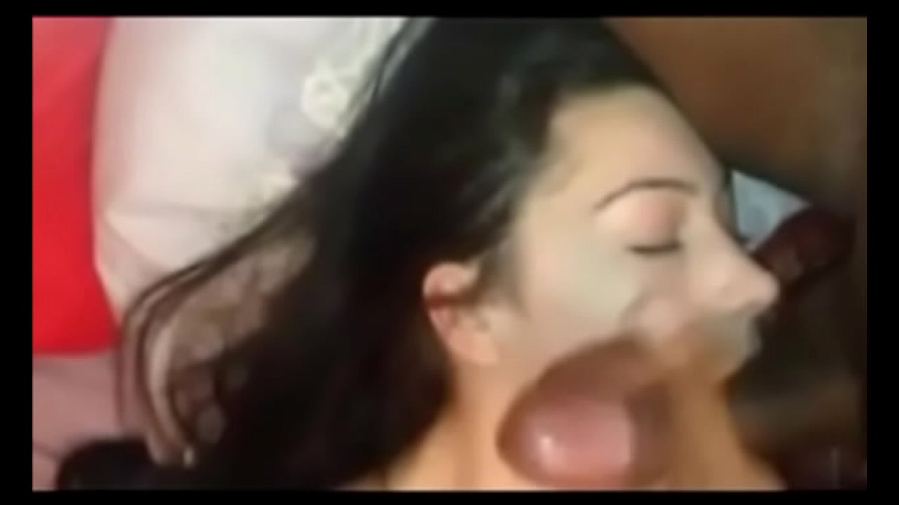 Skinny Brunette teen sucking on a black cock