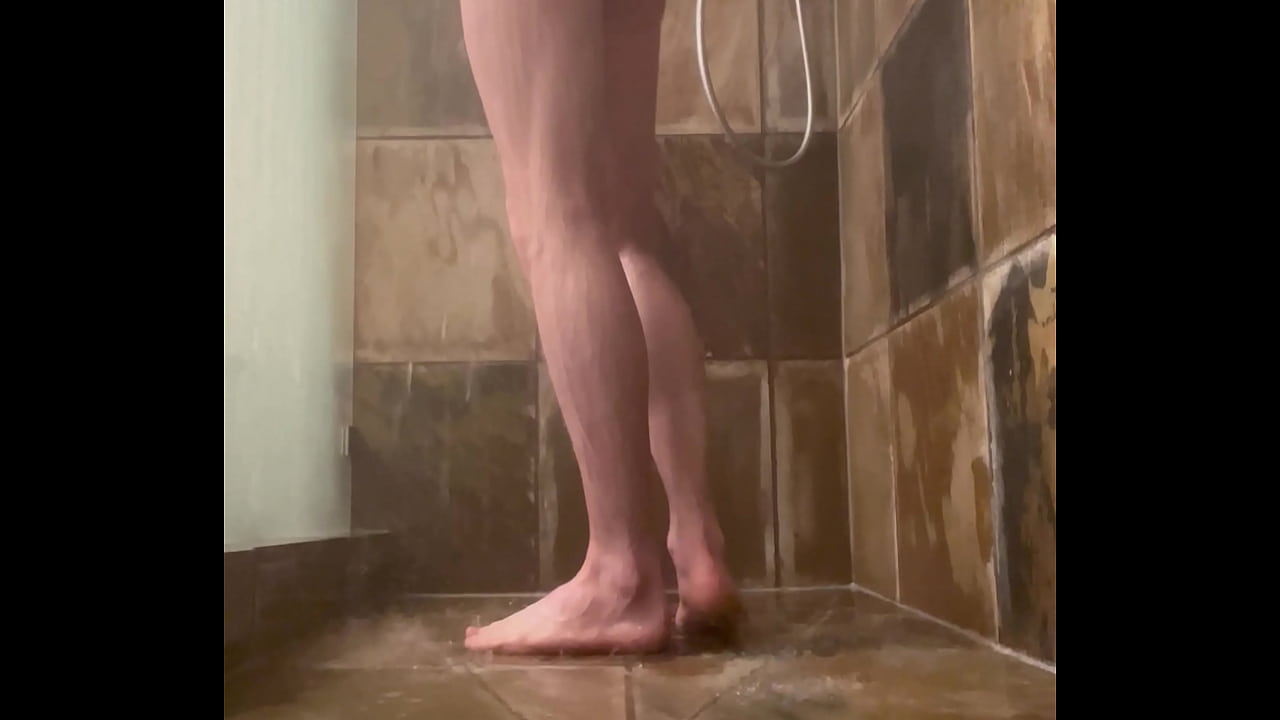 Young boy showers alone while touching himself