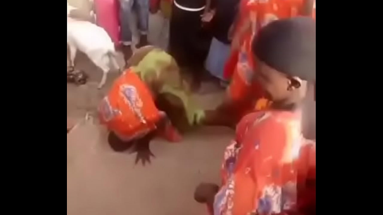 Women gather to dance at the market