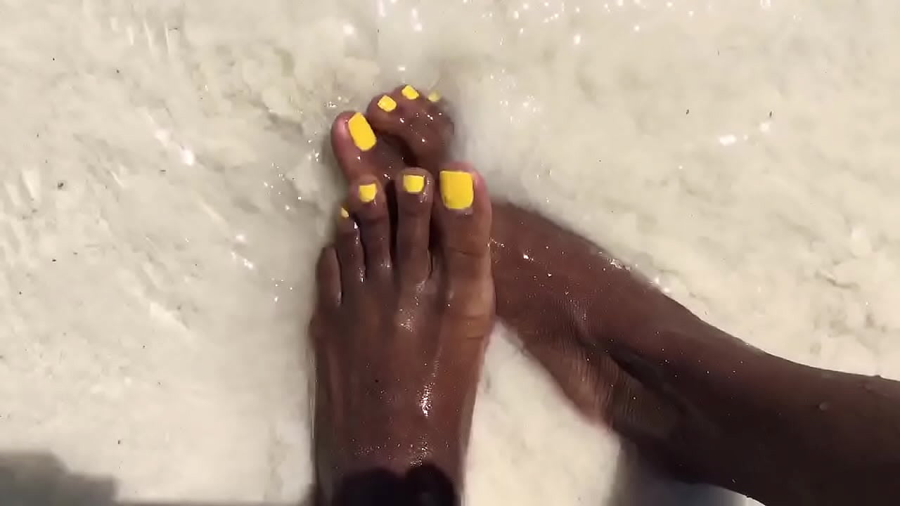 Water over her feet