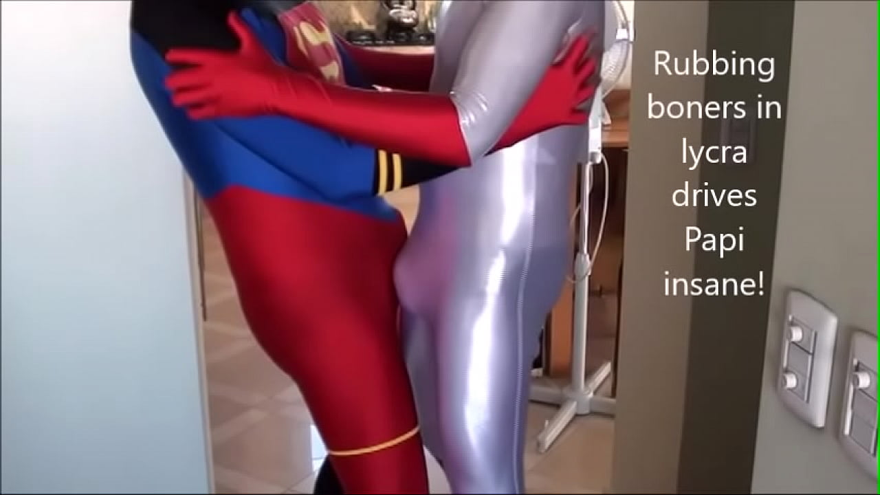 Papi goes insane rubbing bulges in lycra with his Super hero buddy!