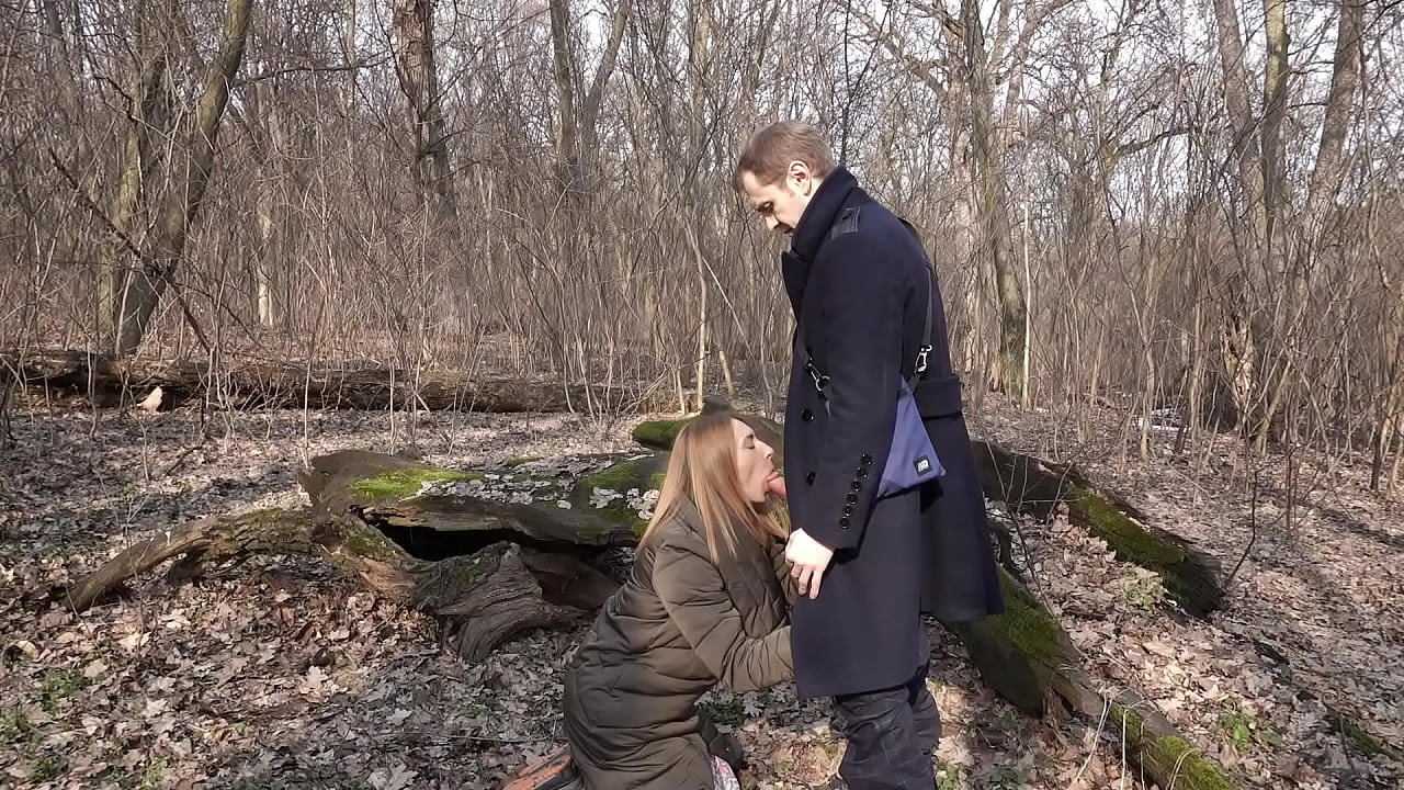 Beautiful girl gave a blowjob in the forest during a walk