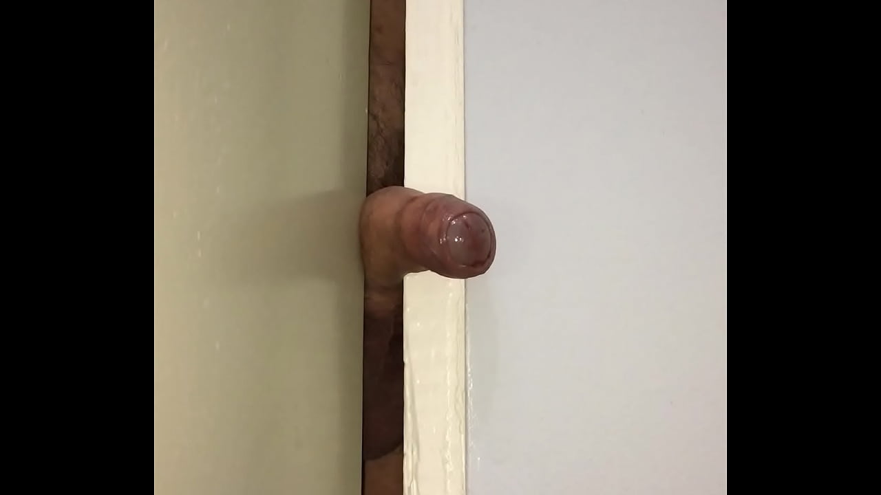 Masturbating Soft Cock thru door for cumshot