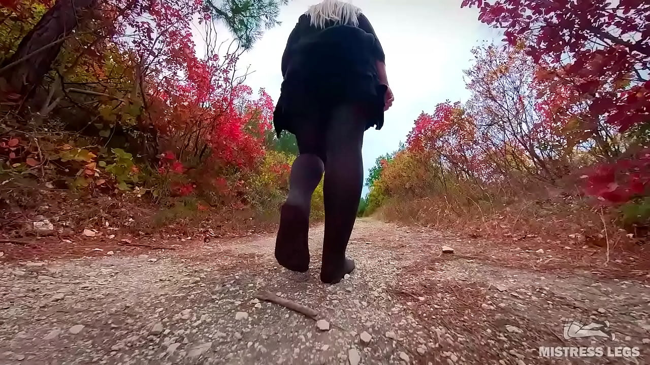 Walking in white socks and pantyhose in the woods