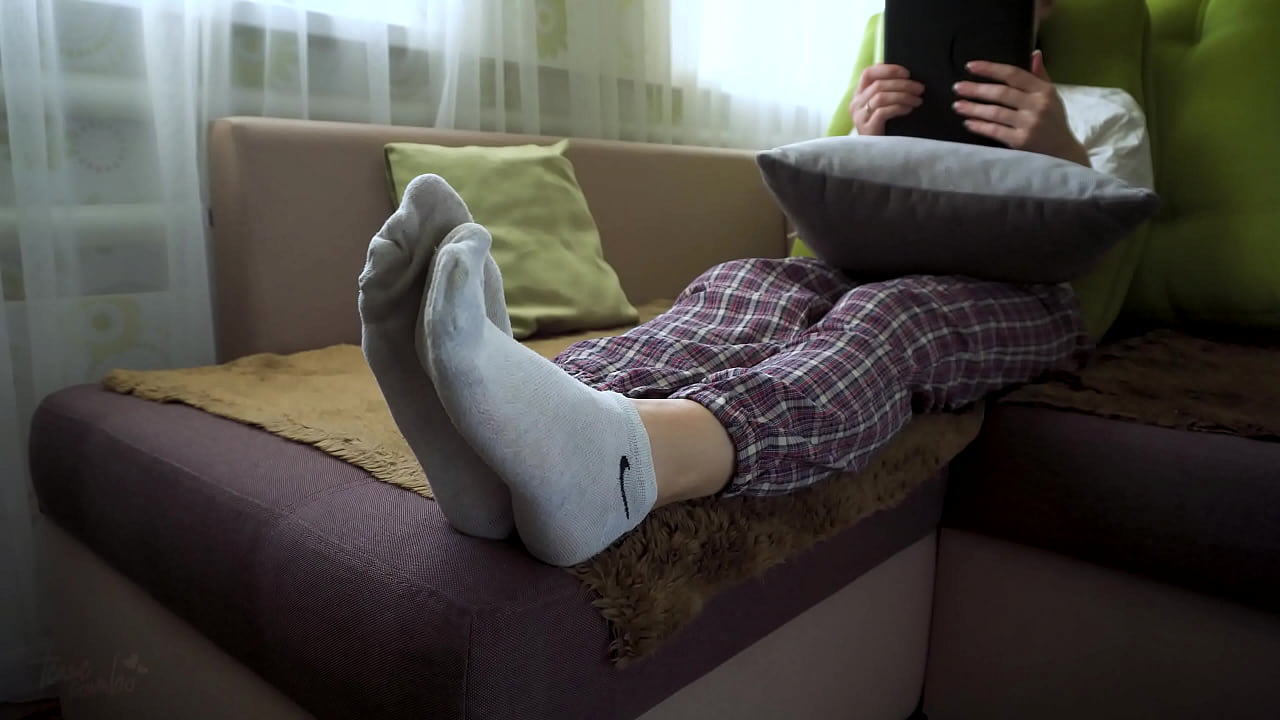 Asian Girl In White Socks Teasing Her Bare Soles