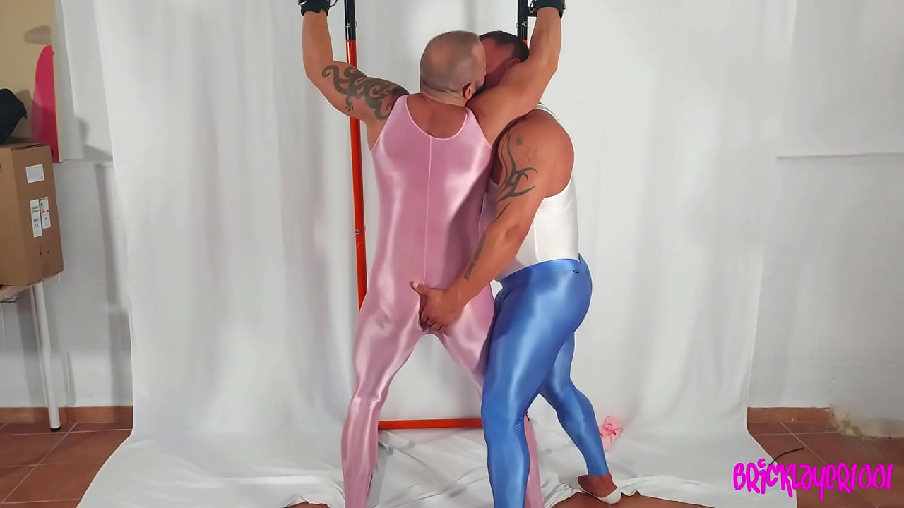 shiny spandex covered BDSM muscle men