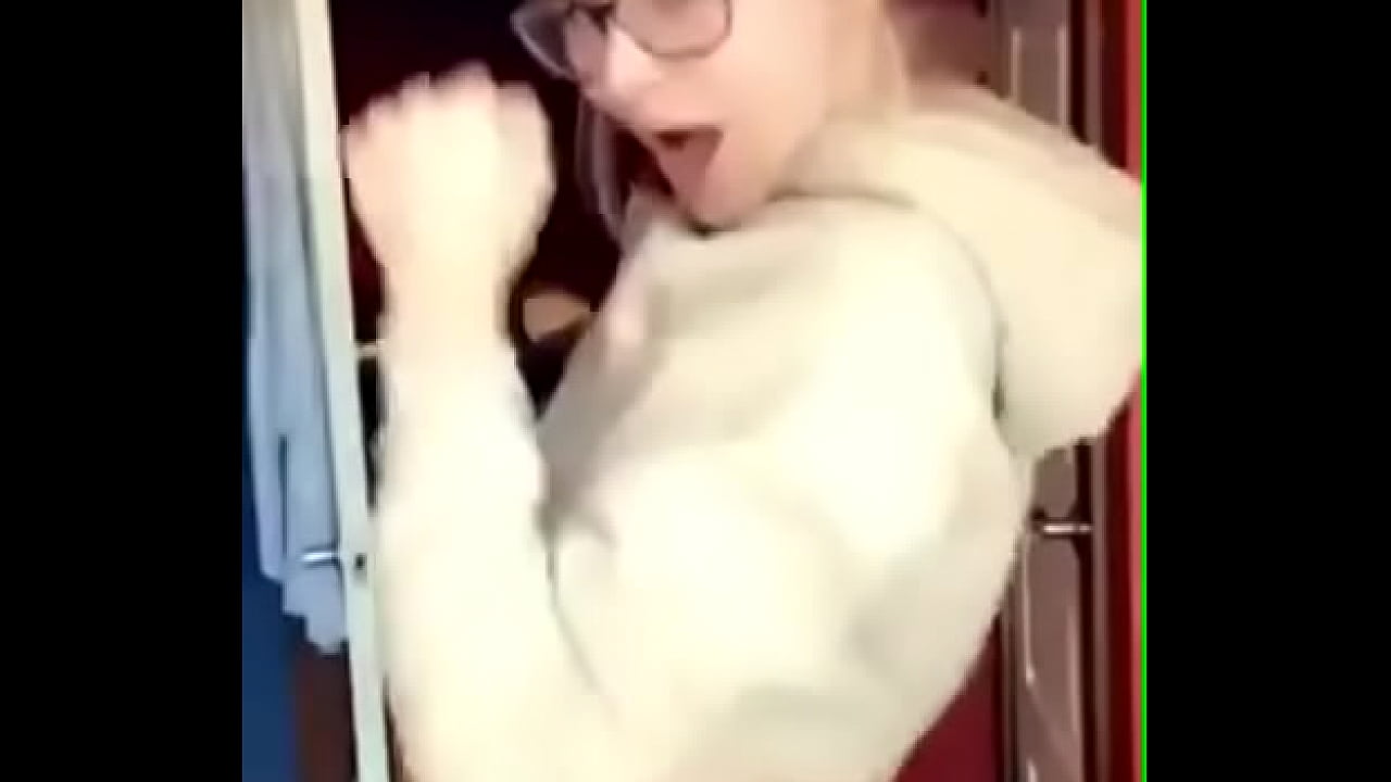 Blonde wearing glasses shakes boobs dancing