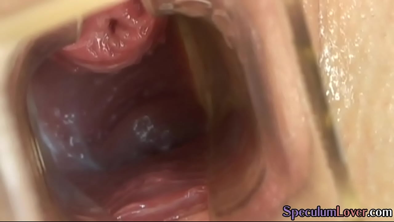 Speculum beauty toying wet cunt before spreading lips