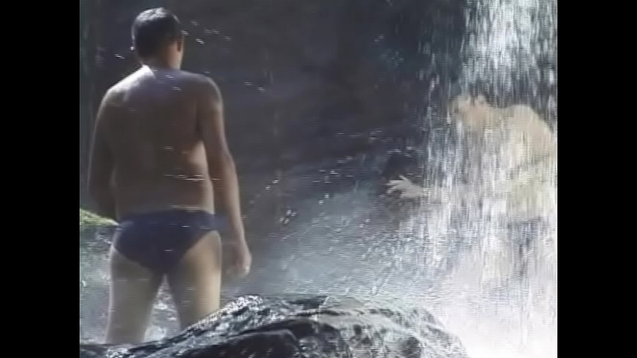 Two gay guys by the waterfall