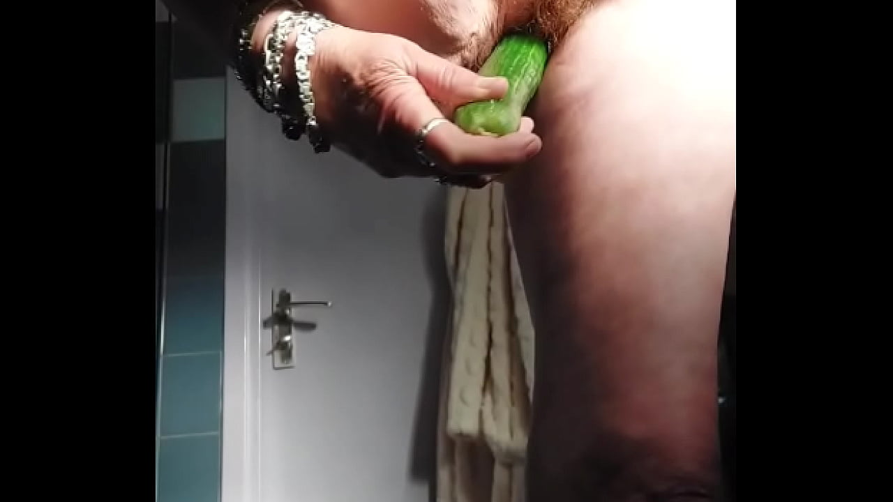 Granny fucks hairy pussy with cucumber