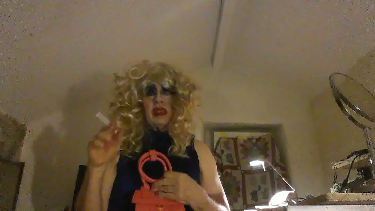 Cross-dresser smokes for you to masturbate and cum over