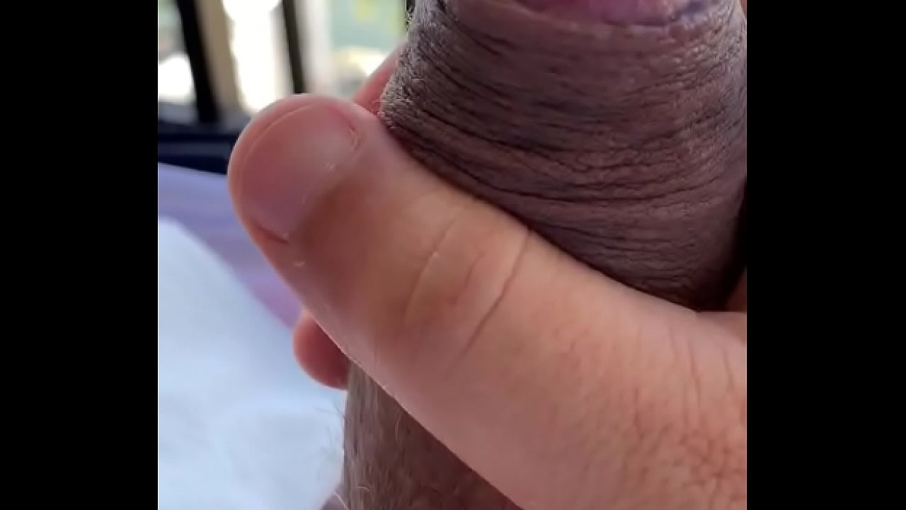 While in hawaii my uncut thick cock cums a lot while I enjoy stroking it alone in open air