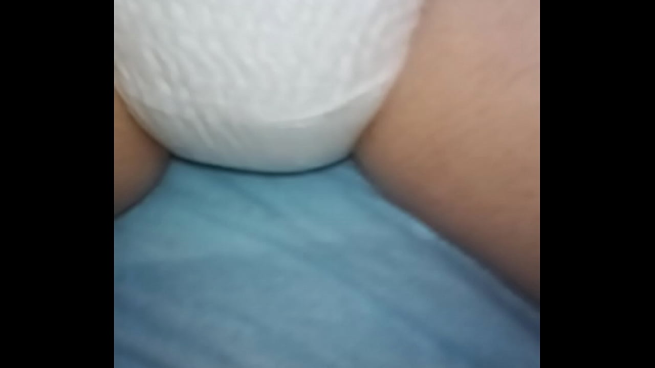 Girl wets her diaper and has a huge wet mess