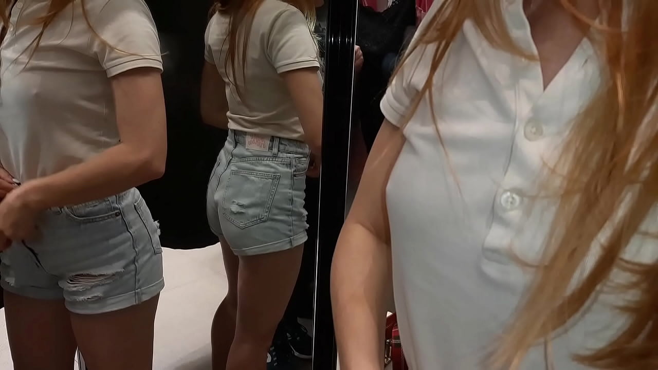 Spying in the fitting room for a randomly familiar girl