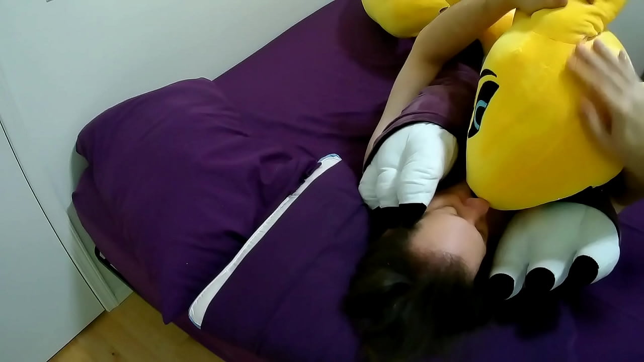 Kissing and cuddling giant Renamon plush