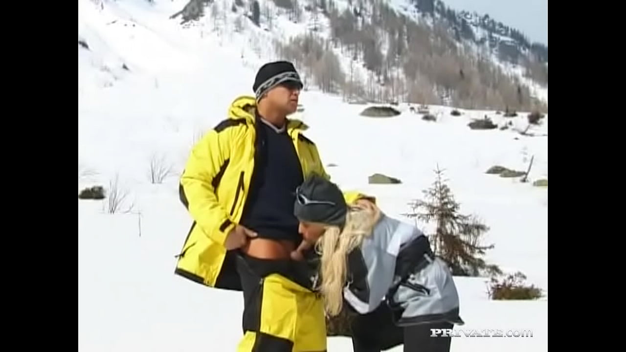 Sharon Bright Is on a Snowy Mountain Giving a Ski Instructor a Blowjob