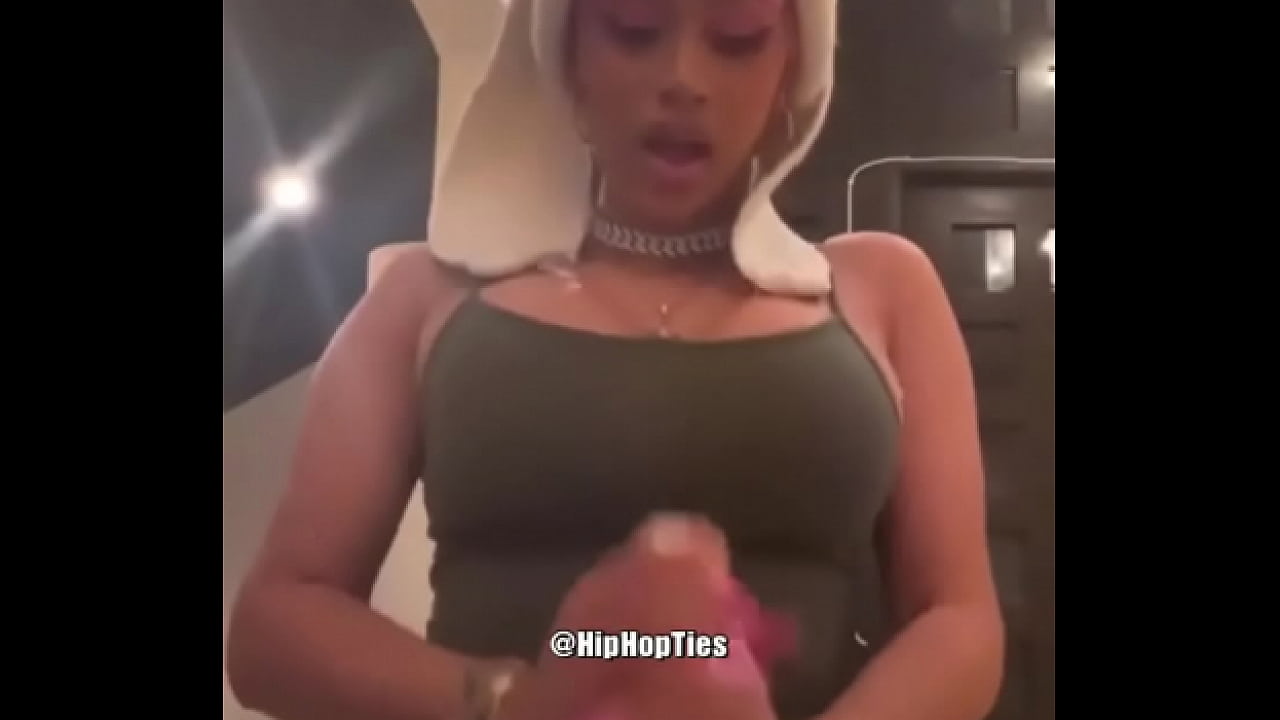 Cardi B gets creamed in mouth.
