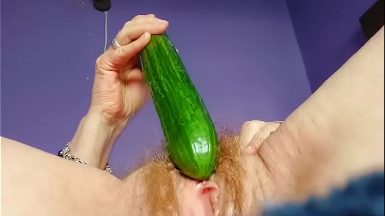 Granny fucks hairy pussy with cucumber