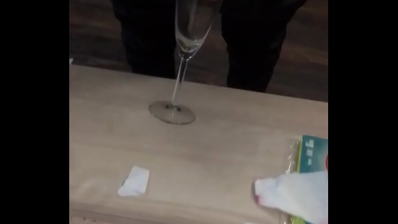 Giselle piss to champagne glass.