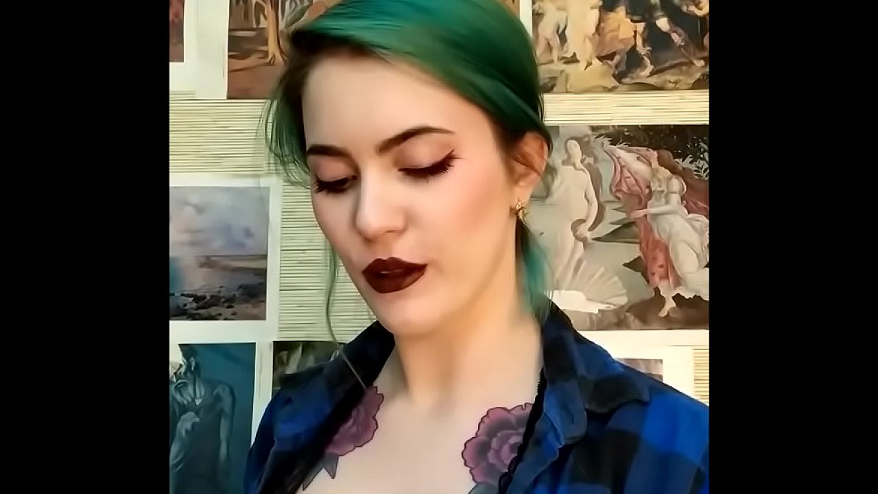 Teen with a dark lipstick plays with the cock