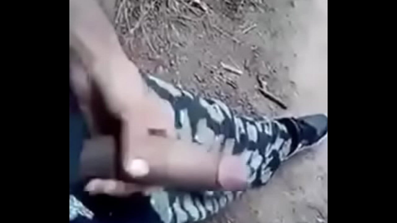 Dude strokes his dick in forest