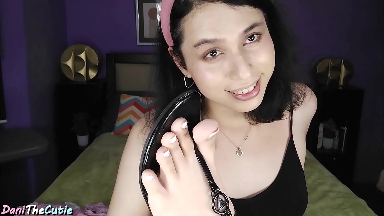 DaniTheCutie licks her own feet and plays with her feet in a pool of cum