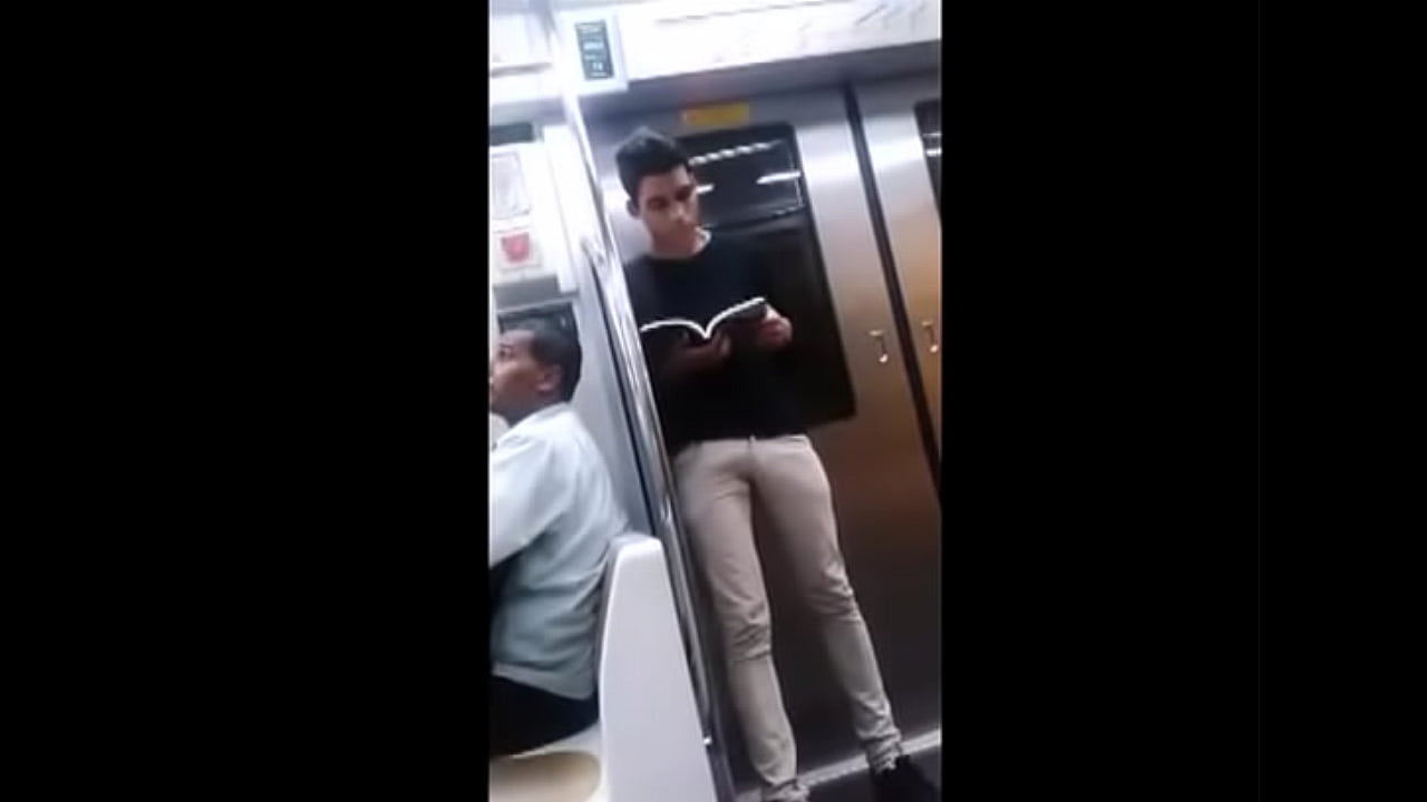 Horny young guy reading a book