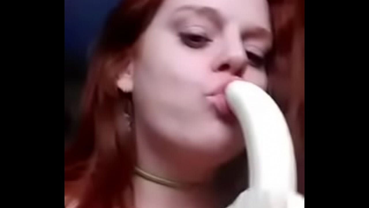 rehead whore sucks a banana