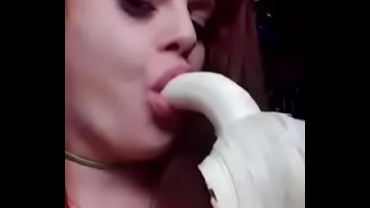 rehead whore sucks a banana