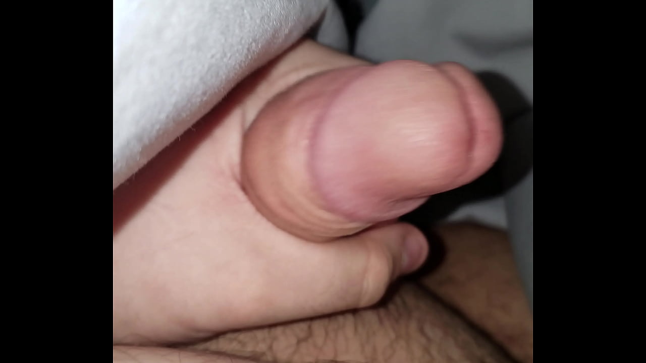 Jerking off and precuming a little.
