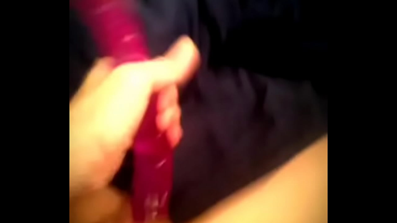 using her dildo on her smooth wet pussy