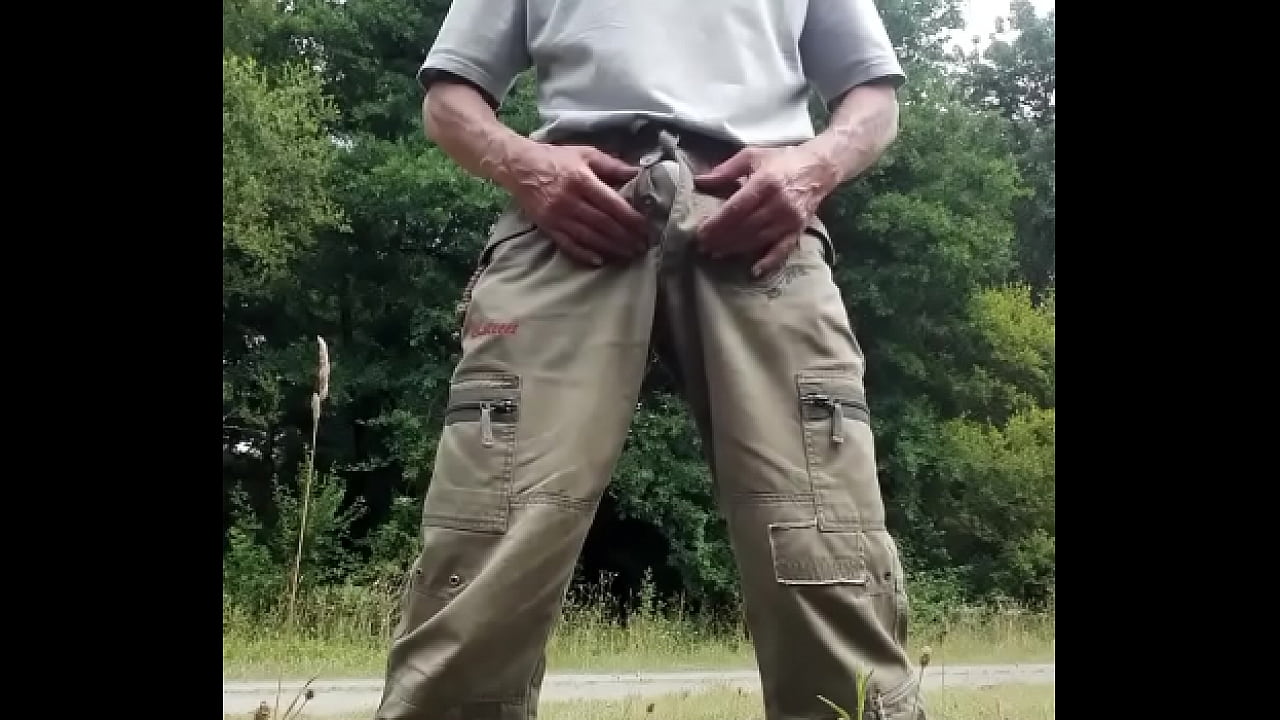 I piss and caress my cock outdoors