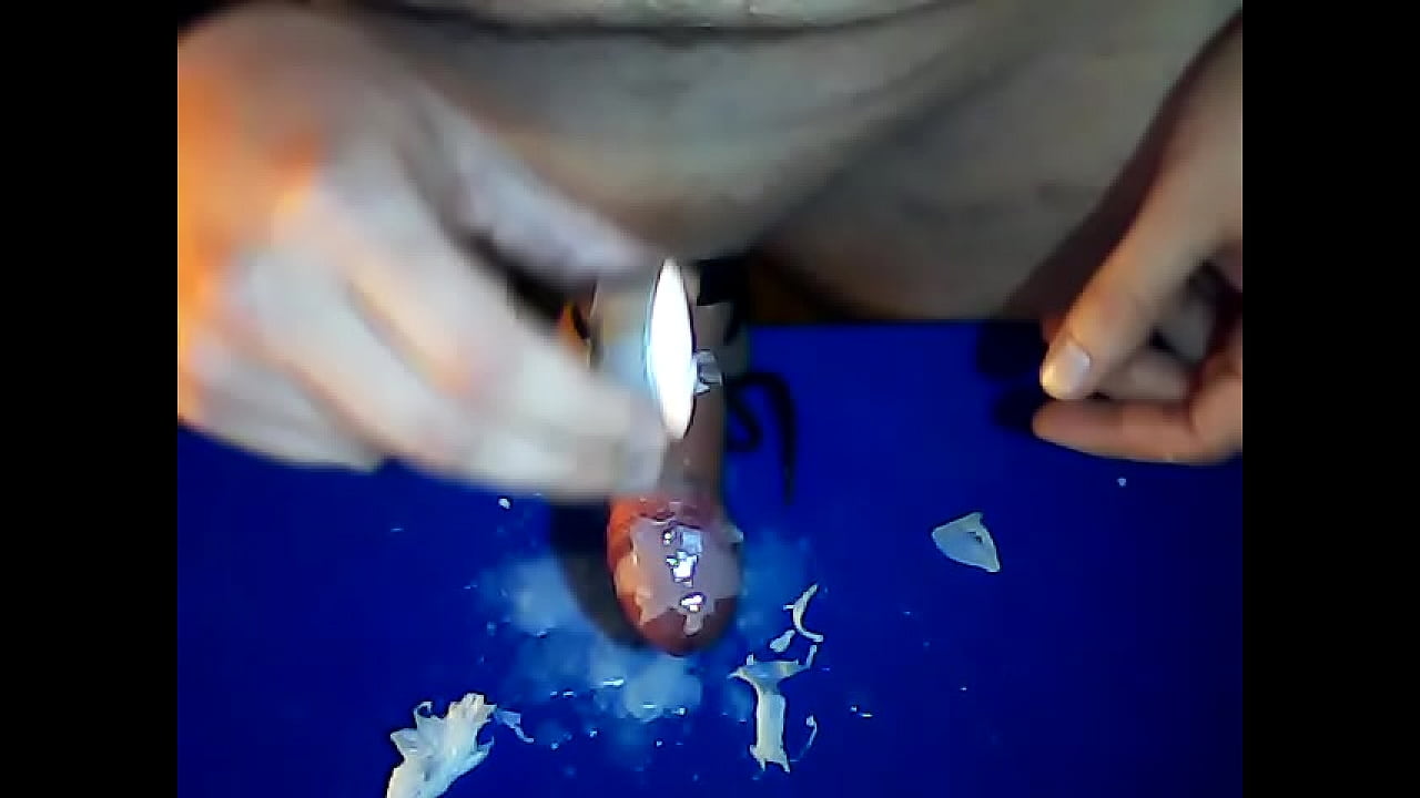 young boy drops candle wax on glans and bound balls