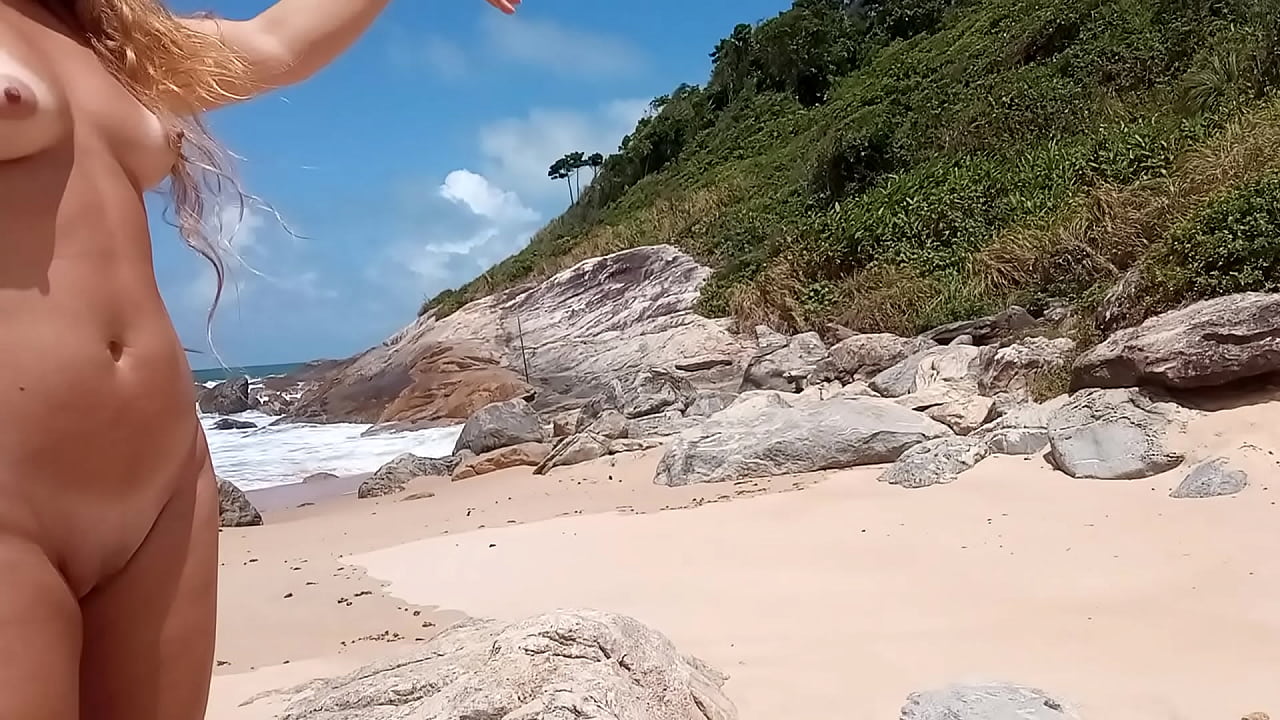 Bitch and slut gets naked on crowded beach