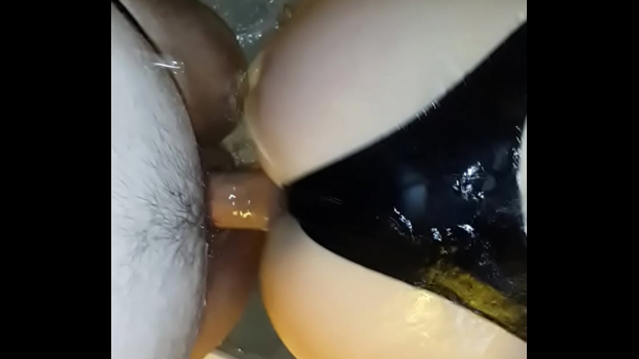 Me fucking my wife's big wet ass in latex strings in shower