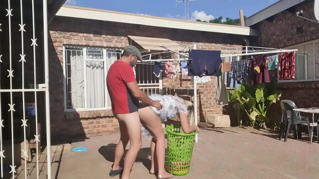 Outdoor fucking while taking off the laundry