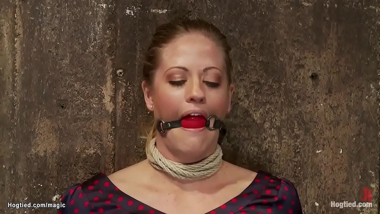 Busty blonde slave Holly Hearts sitting in chair with ball gag in mouth then pelvis pulled in crotch rope bondage and pussy vibed by Matt Williams and big tits Isis Love